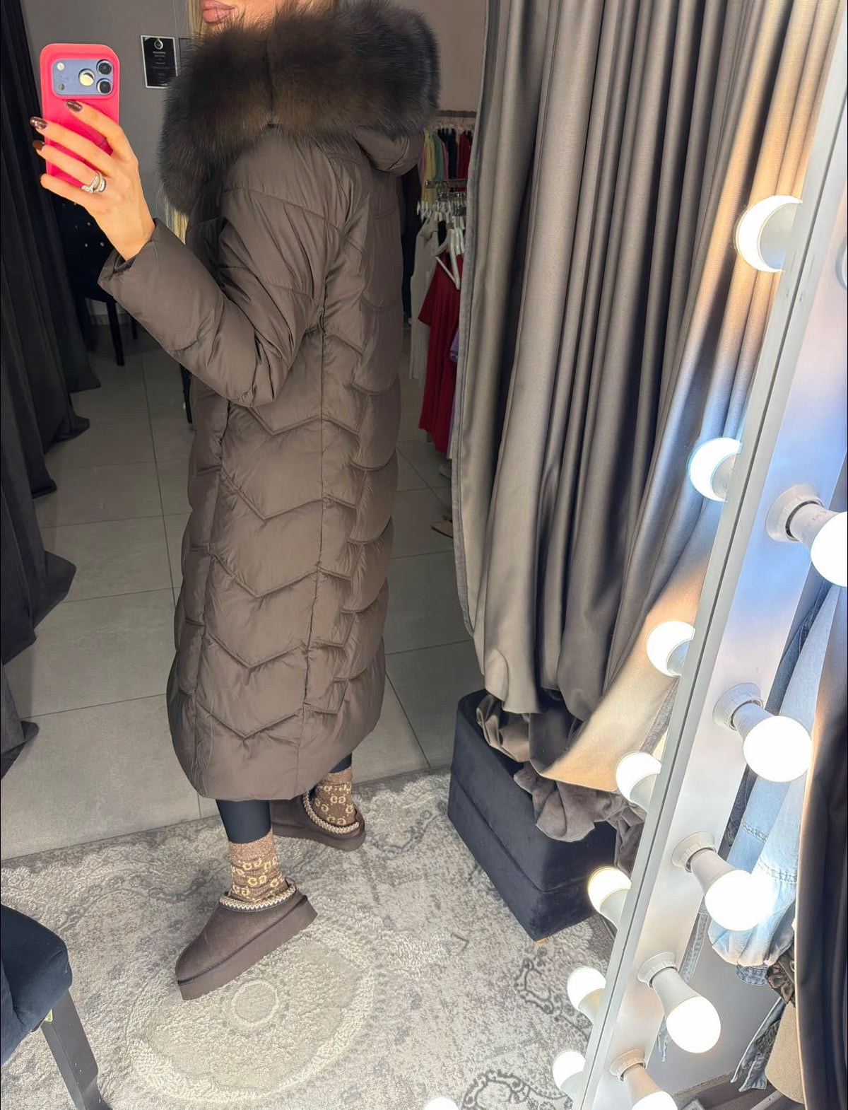 Brown long puffer coat – side view showing length and zigzag quilting