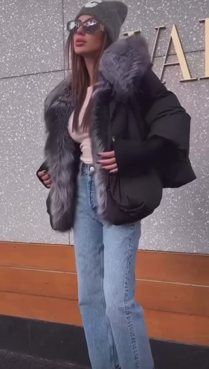 Video of Natural Down One Size Winter Jacket from EME boutique